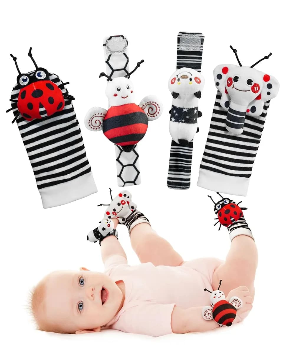 baby wrist rattles and foot finder socks in black and white